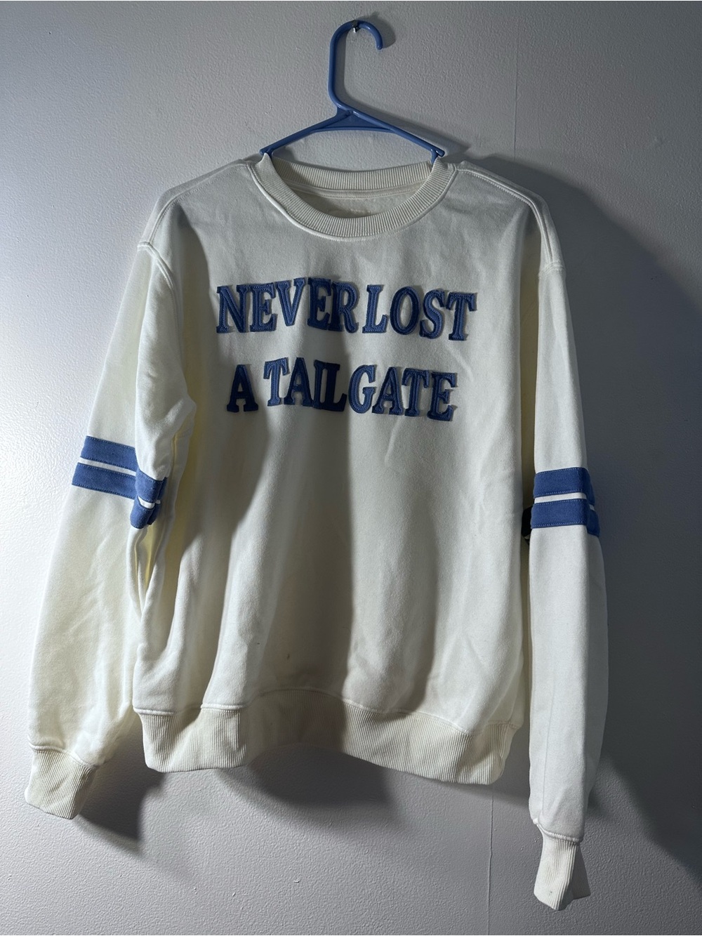 Cream Crewneck Sweatshirt with Blue Lettering and Sleeve Stripes - Women